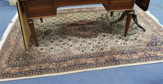 A Persian cream ground medallion carpet, 271 x 181cm